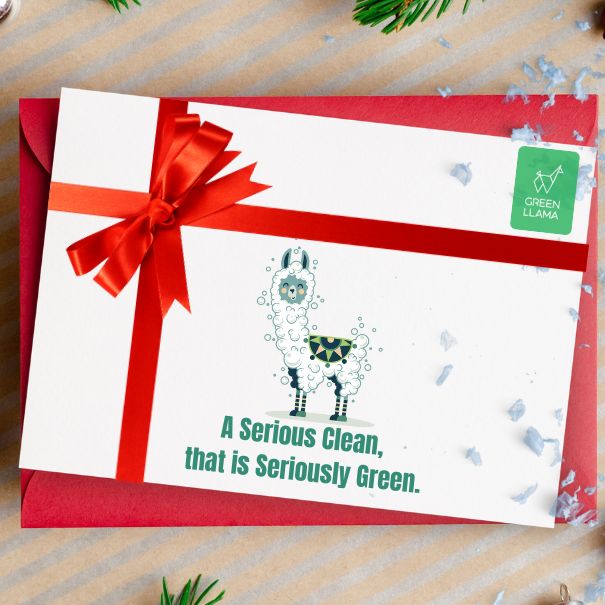 The Green Llama Digital Gift Card by Green Llama comes in a greeting card with a red ribbon, cartoon llama, and “A Serious Clean, that is Seriously Green” text. Perfect for gifting eco-friendly cleaning or sustainable home care. Includes festive red envelope.